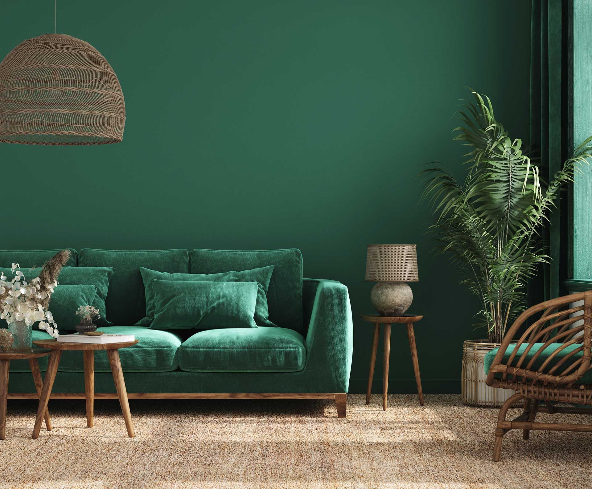 Green living room and matching sofa - 2025 home remodeling trends