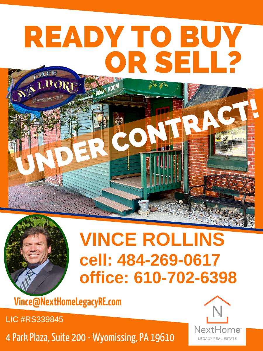 Real estate ad for Vince Rollins with “Ready to Buy or Sell?” and “Under Contract!” over a storefront photo