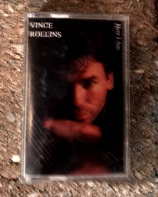 Vince Rollins cassette case with a dark portrait cover and red title text