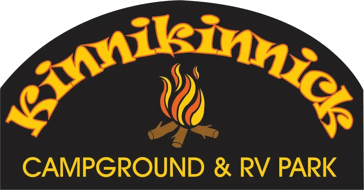 Kinnikinnick Campground & RV Park logo with orange text and a campfire icon on a dark background