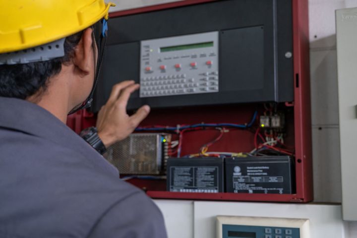 checking fire alarm system in a commercial building