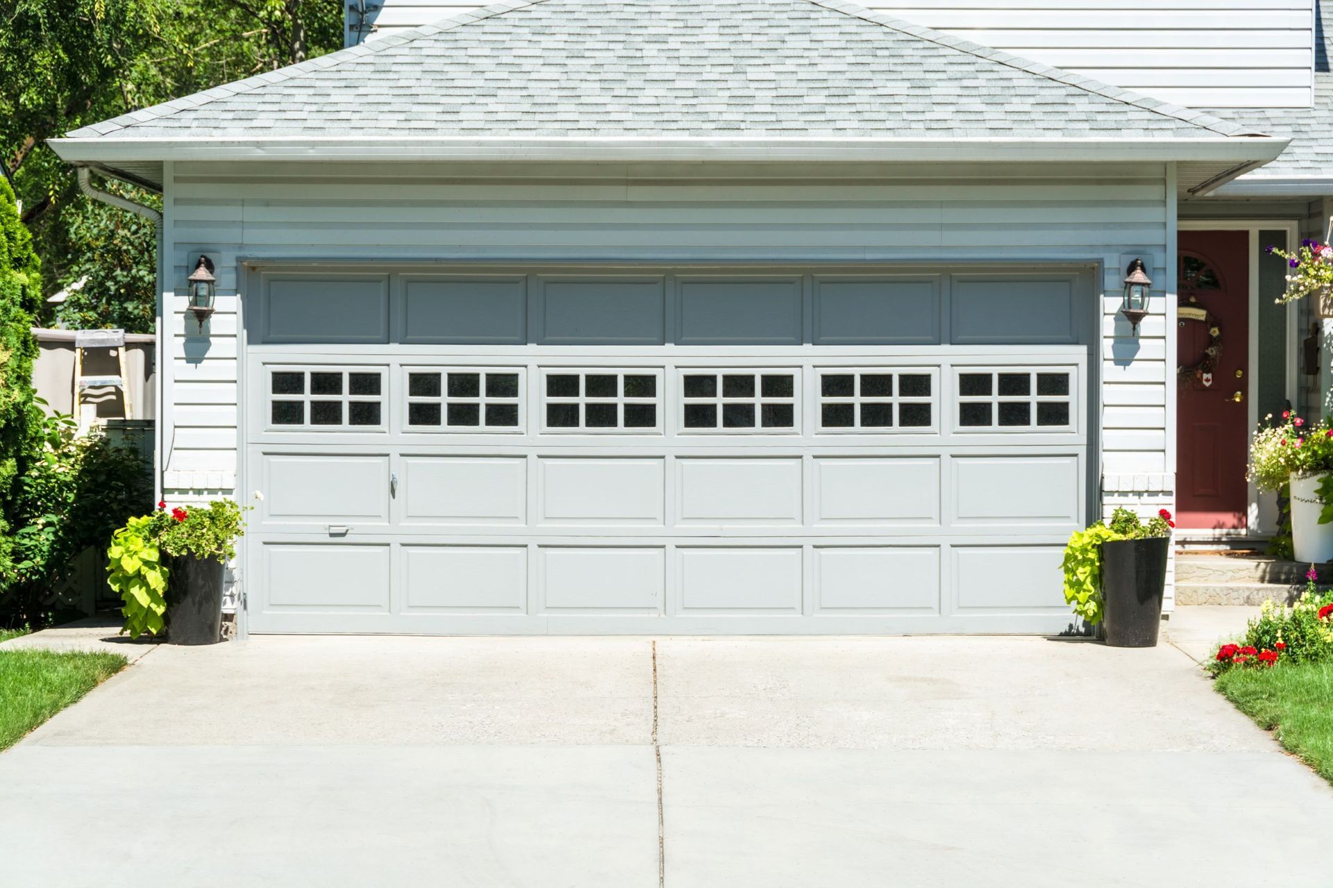 An image of a Concrete Driveway leading to a garage attached to a home in Akron OH