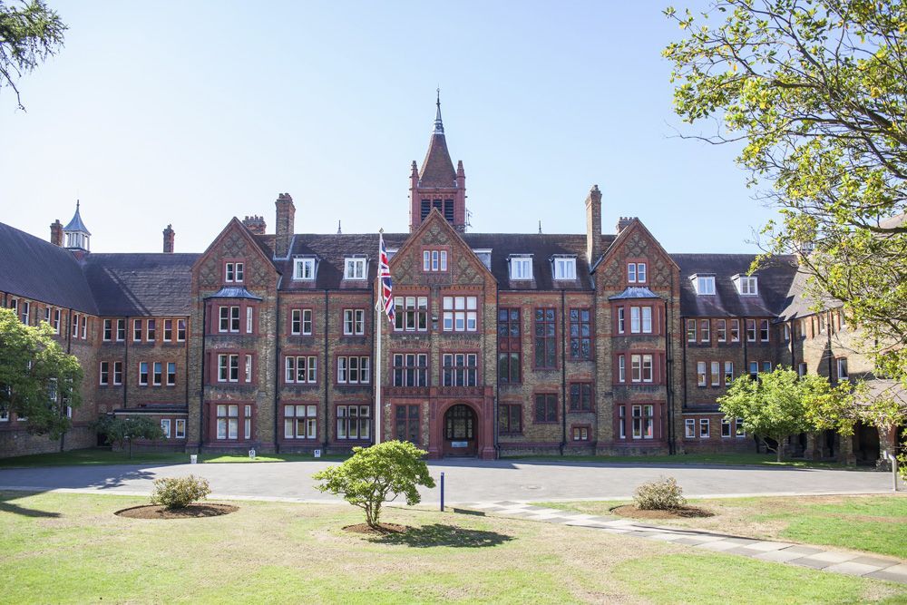 Grand red-brick Victorian school building in Bushey