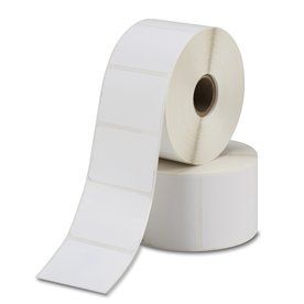 Two rolls of white blank shipping labels. One is partially unrolled, showing individual labels.