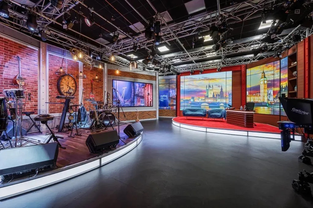 Television studio with lighting rigs and sets in Borehamwood