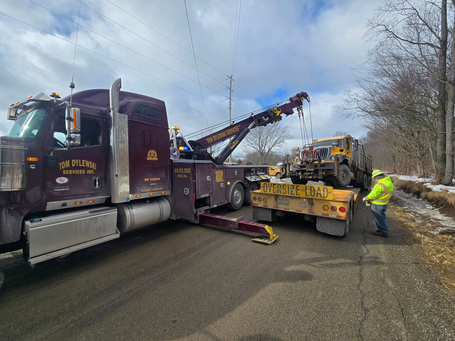 A car is upside down on the side of the road. A car is upside down on the side of the road.
