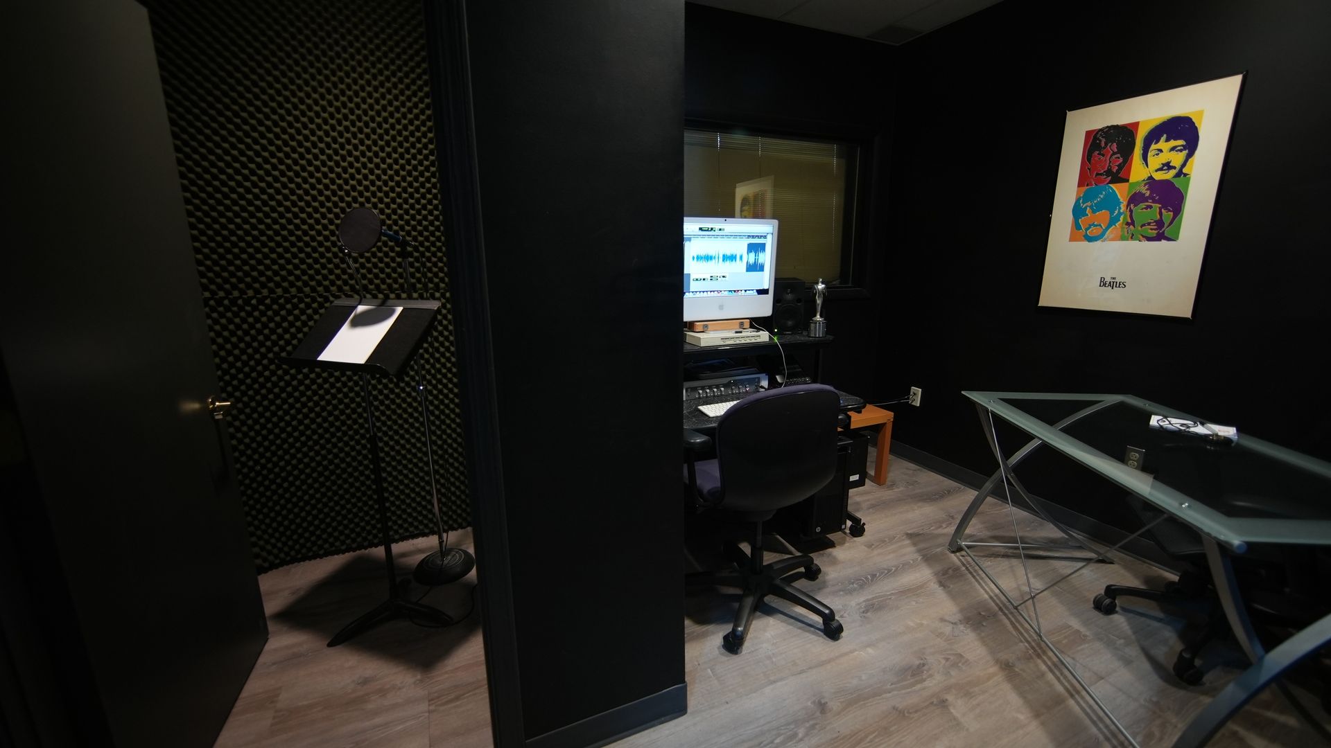 Two microphones are sitting on top of a mixer.