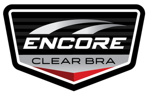 Logo for Encore Clear Bra featuring white text on a black and grey shield with a red accent triangle at the bottom.