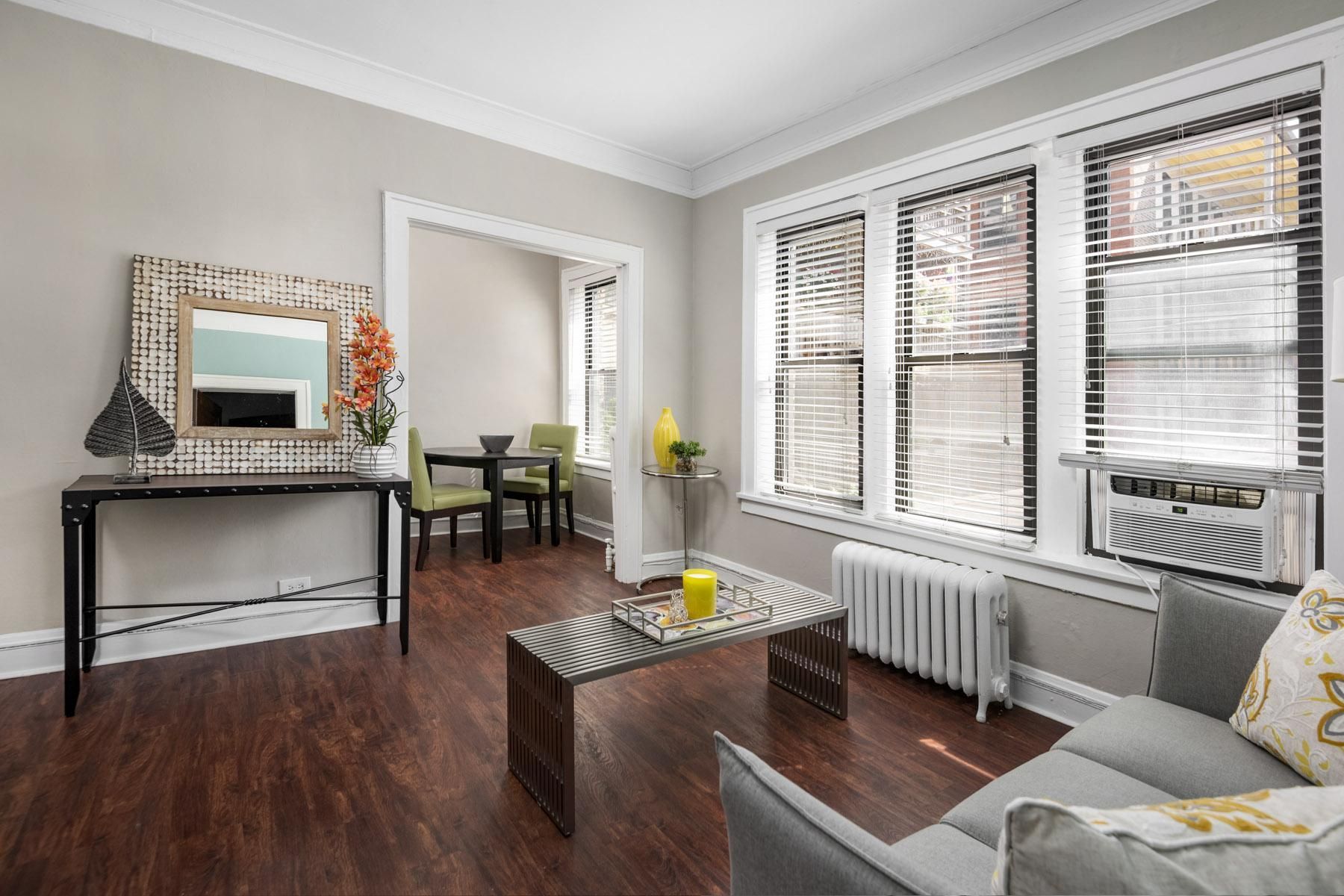 a living room with a couch and a table