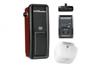 Three Lifemaster garage door opener components on white background: wall unit, remote, and ceiling sensor set