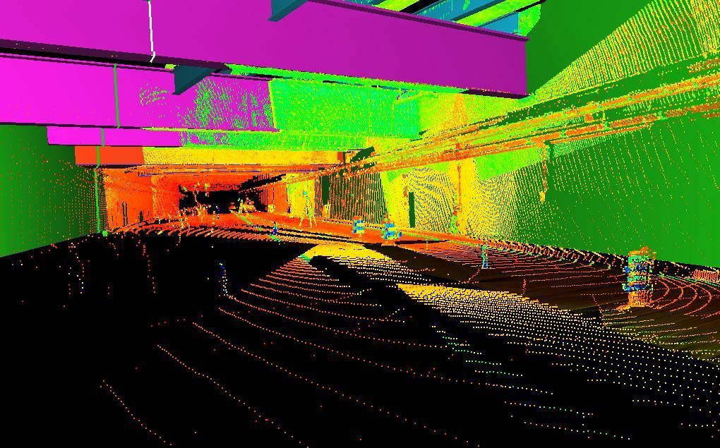 Glitchy neon street scene with a dark road, green and magenta buildings, and orange-lit trees