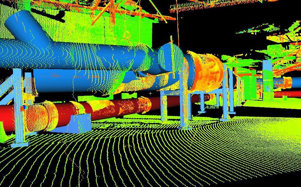 Color-coded 3D scan of industrial pipes and equipment in a plant