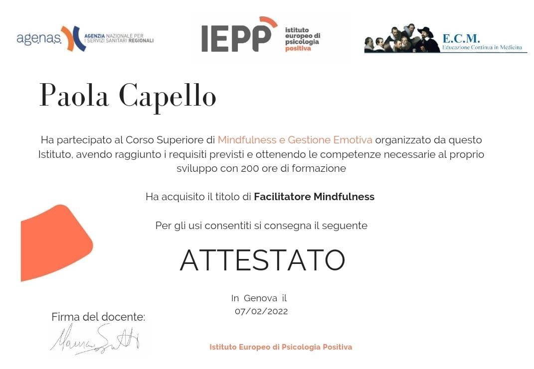 Certificato per Paola Capello con forma arancione e scritta