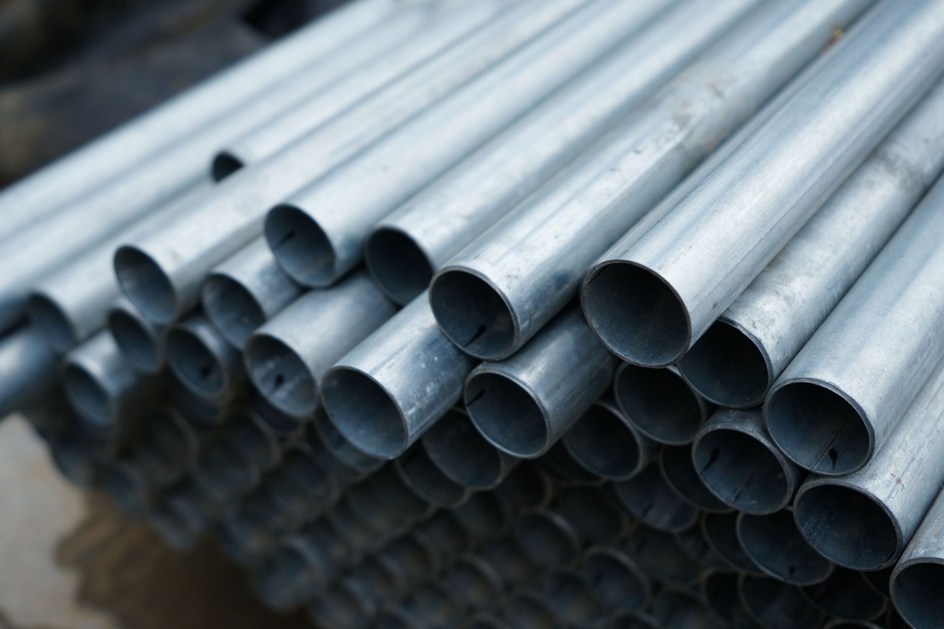 Galvanized steel tubing stacked and ready for fabrication, construction, and industrial use. Galvanized steel tubing stacked and ready for fabrication, construction, and industrial use.
