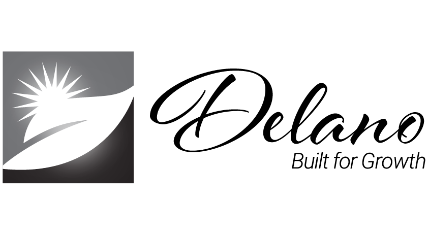A black and white logo for the City of Delano
