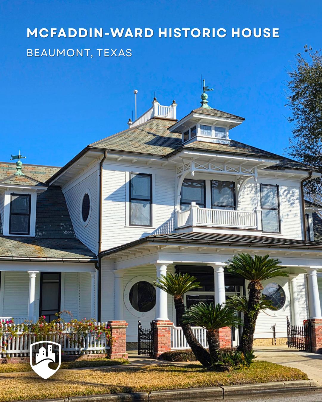 McFaddin-Ward Historic House in Beaumont, Texas, a white Victorian home with a porch and tower under a blue sky