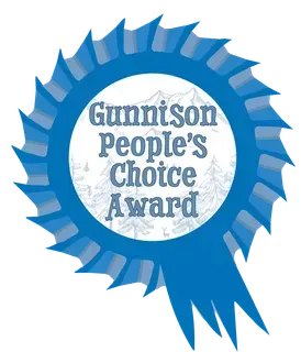 Blue rosette award badge reading “Gunnison People’s Choice Award”