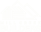 Faint white Mill Creek Builders logo with house outline and text on a light background