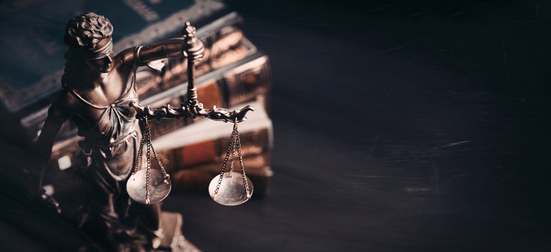 A Scale Of Justice On A Table — Green Bay, WI — Brabazon Law Office LLC