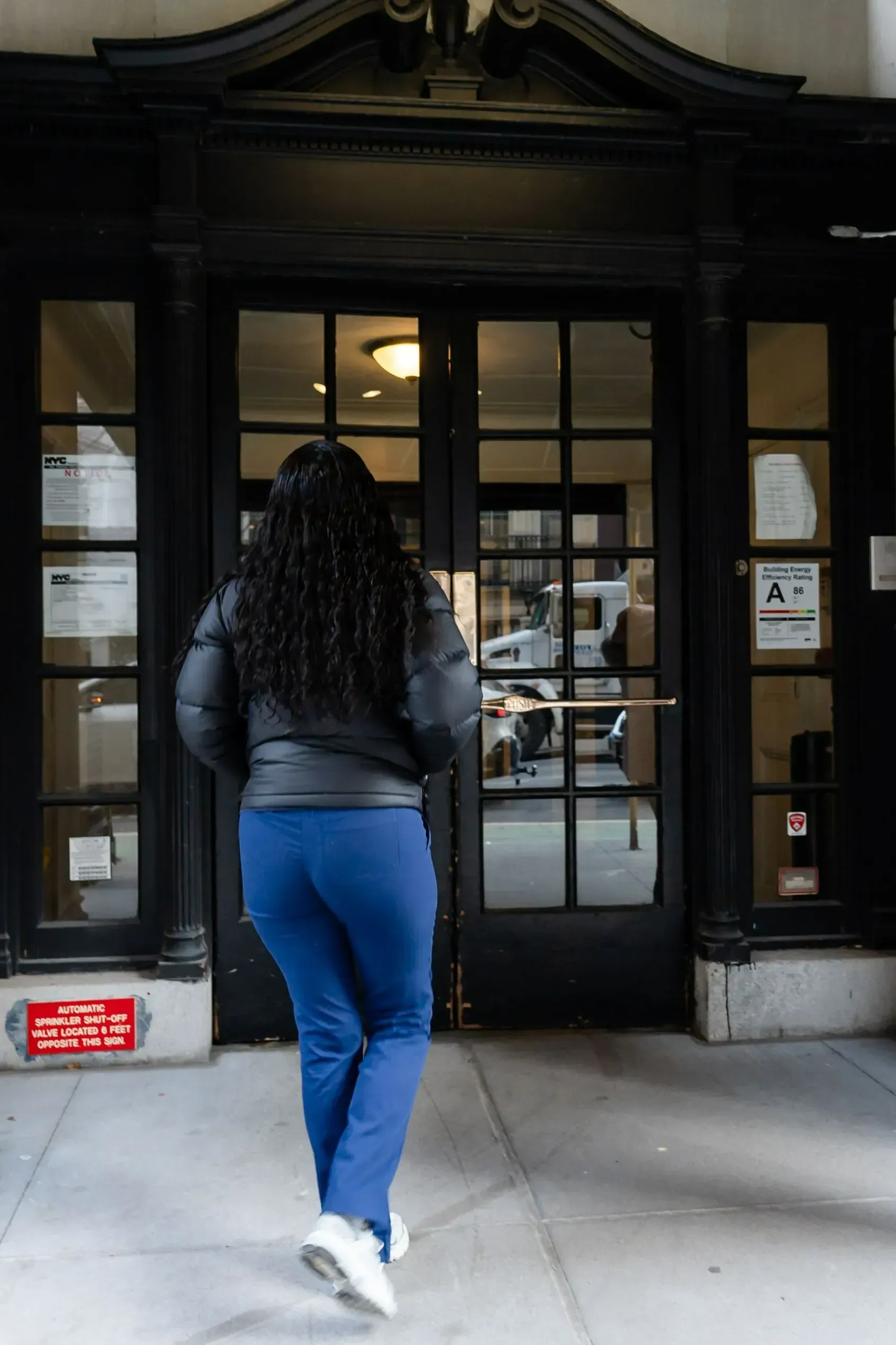 A patient walking into the building at 115 East 61st Street