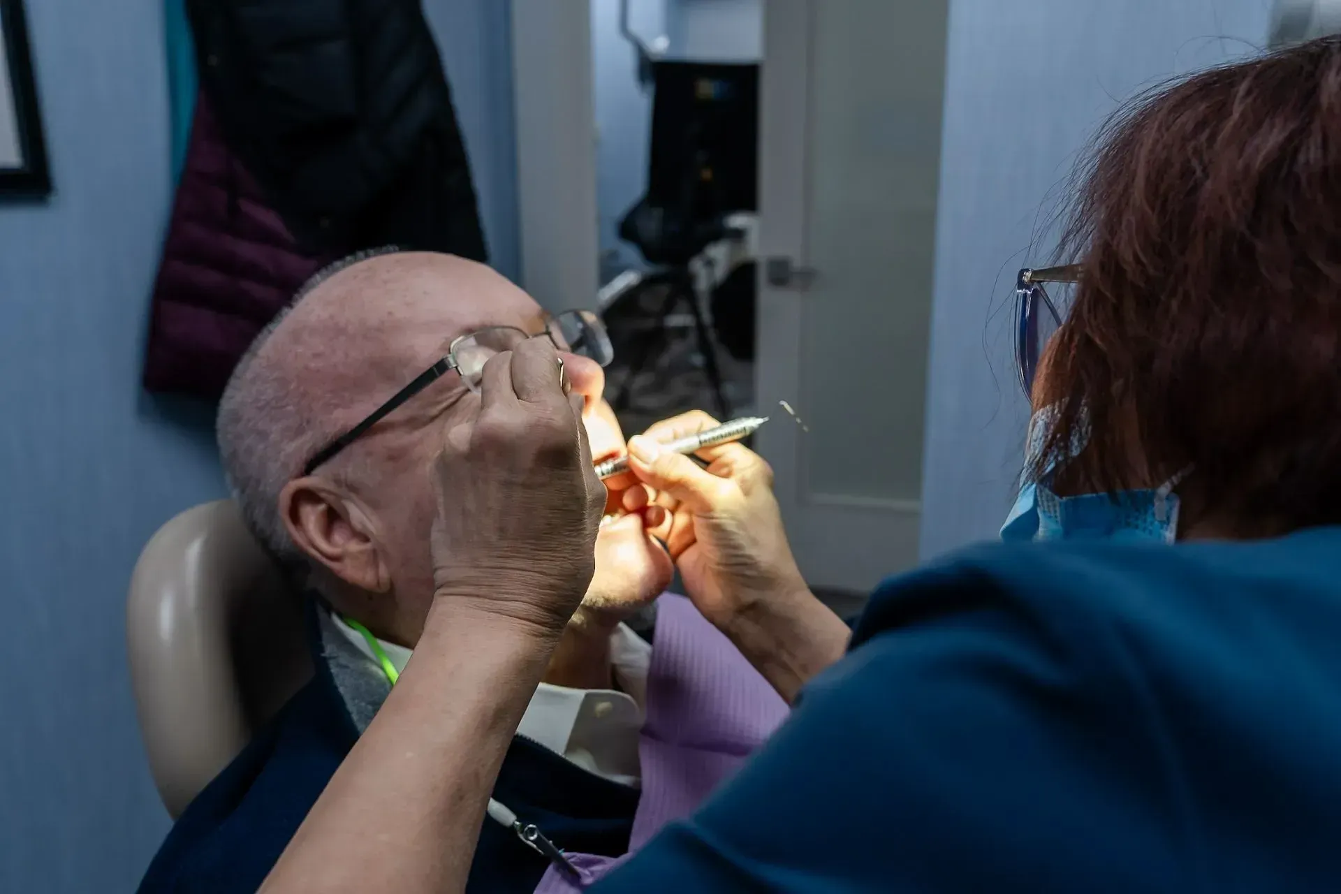 A patient in the dental chair during an exam