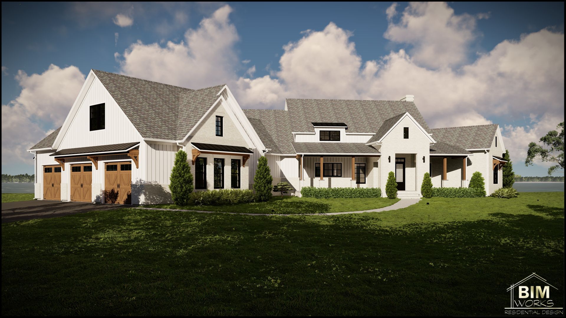A large white house with a gray roof is sitting on top of a lush green field.
