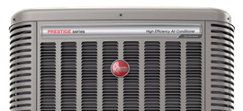 Front view of a silver vintage appliance with black vents and a red circular logo