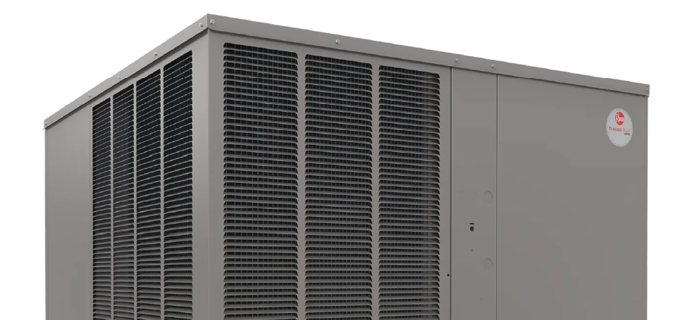 Large gray industrial HVAC unit with black grille panels and a red logo on the corner
