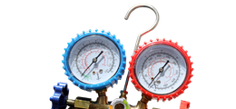 Two pressure gauges, one blue and one red, connected by an HVAC hose manifold