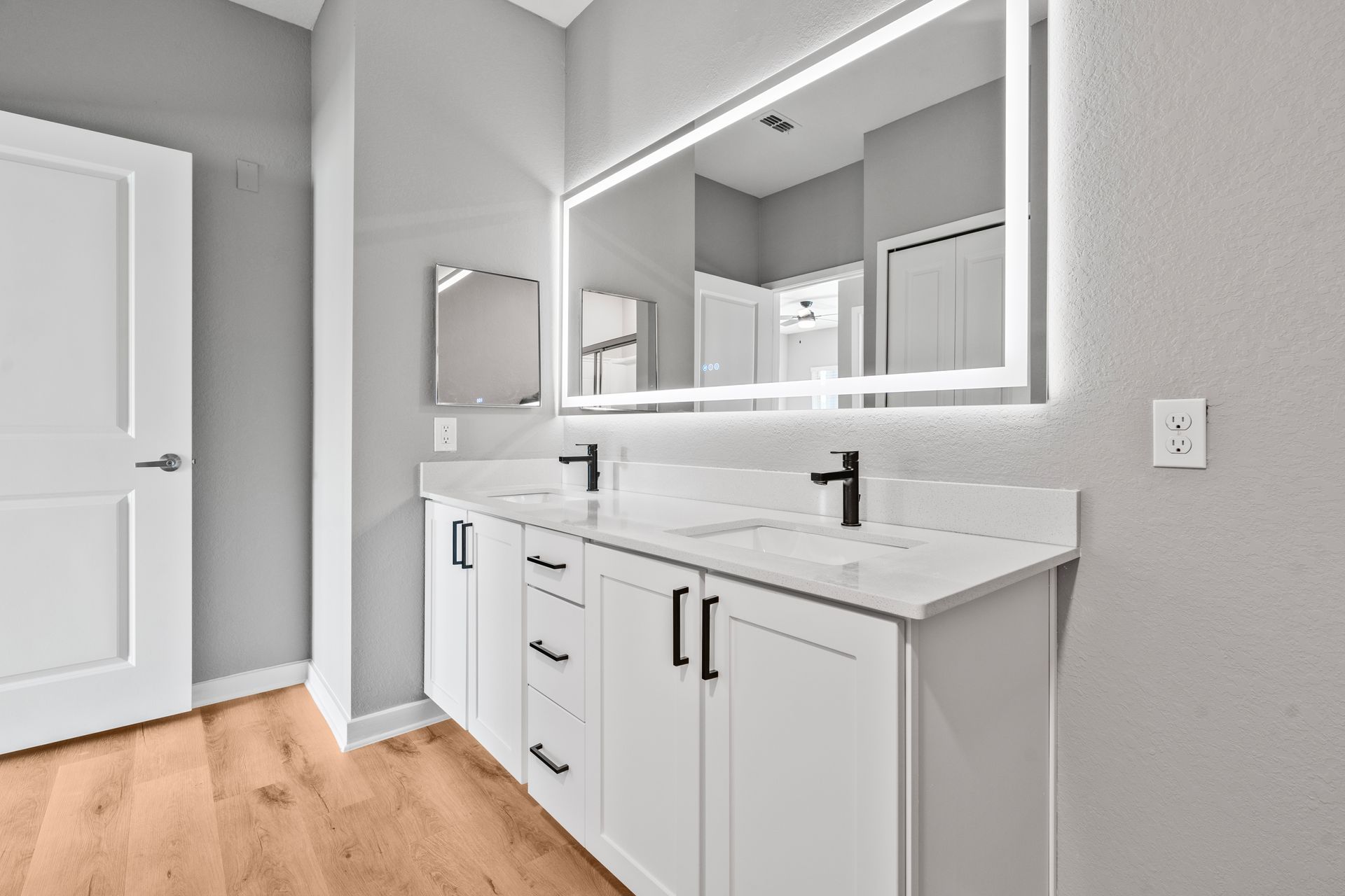luxury bathroom with dual vanities at Creekside Ranch Apartments in Bradenton