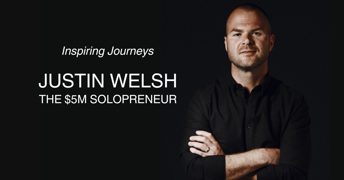 A man in a black shirt is standing with his arms crossed