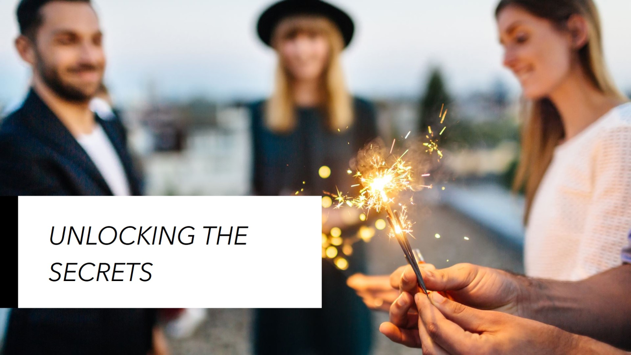 A group of people are holding sparklers in their hands.