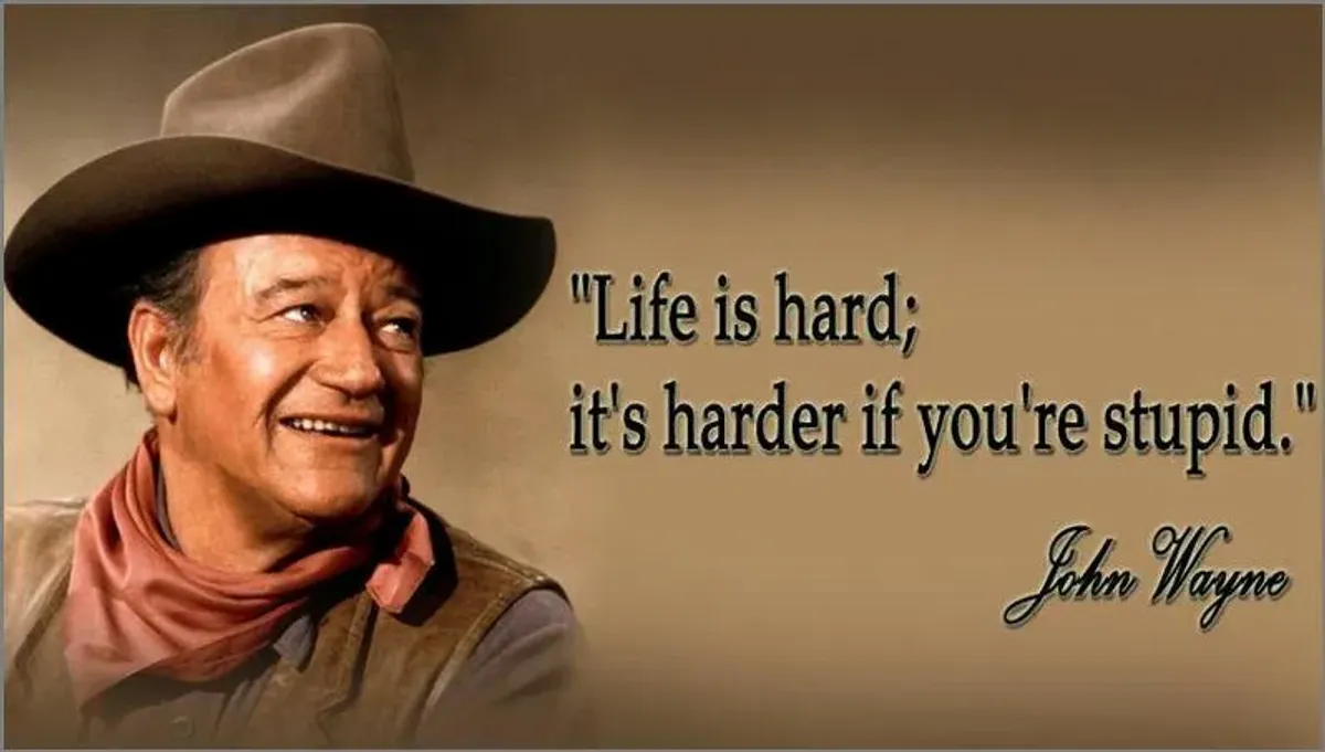 A picture of a cowboy with a quote by john wayne