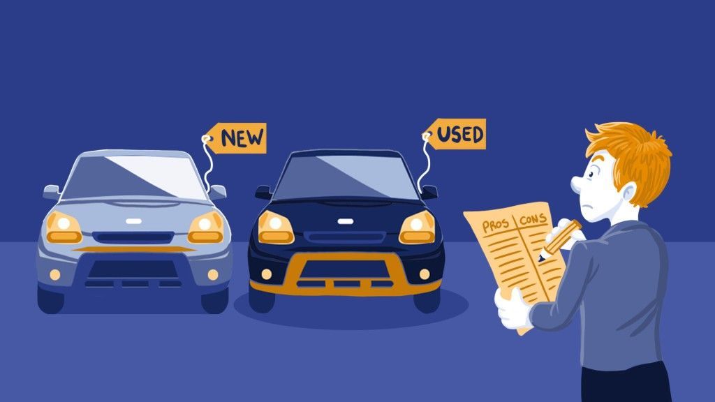 A man is holding a piece of paper in front of two cars.