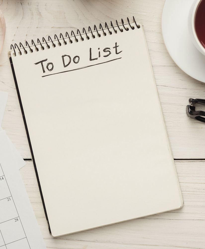 A notebook with the words to do list written on it