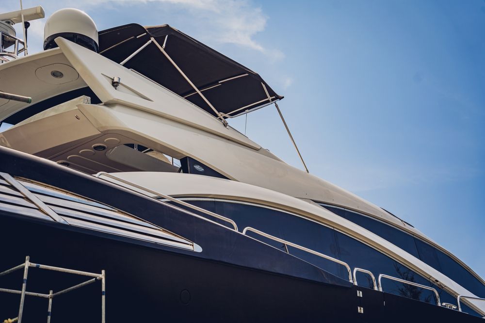 A large yacht with a canopy on top of it.