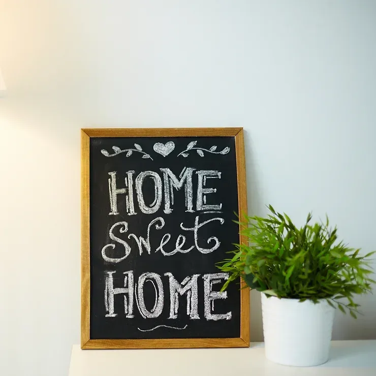 A chalkboard with the words home sweet home written on it
