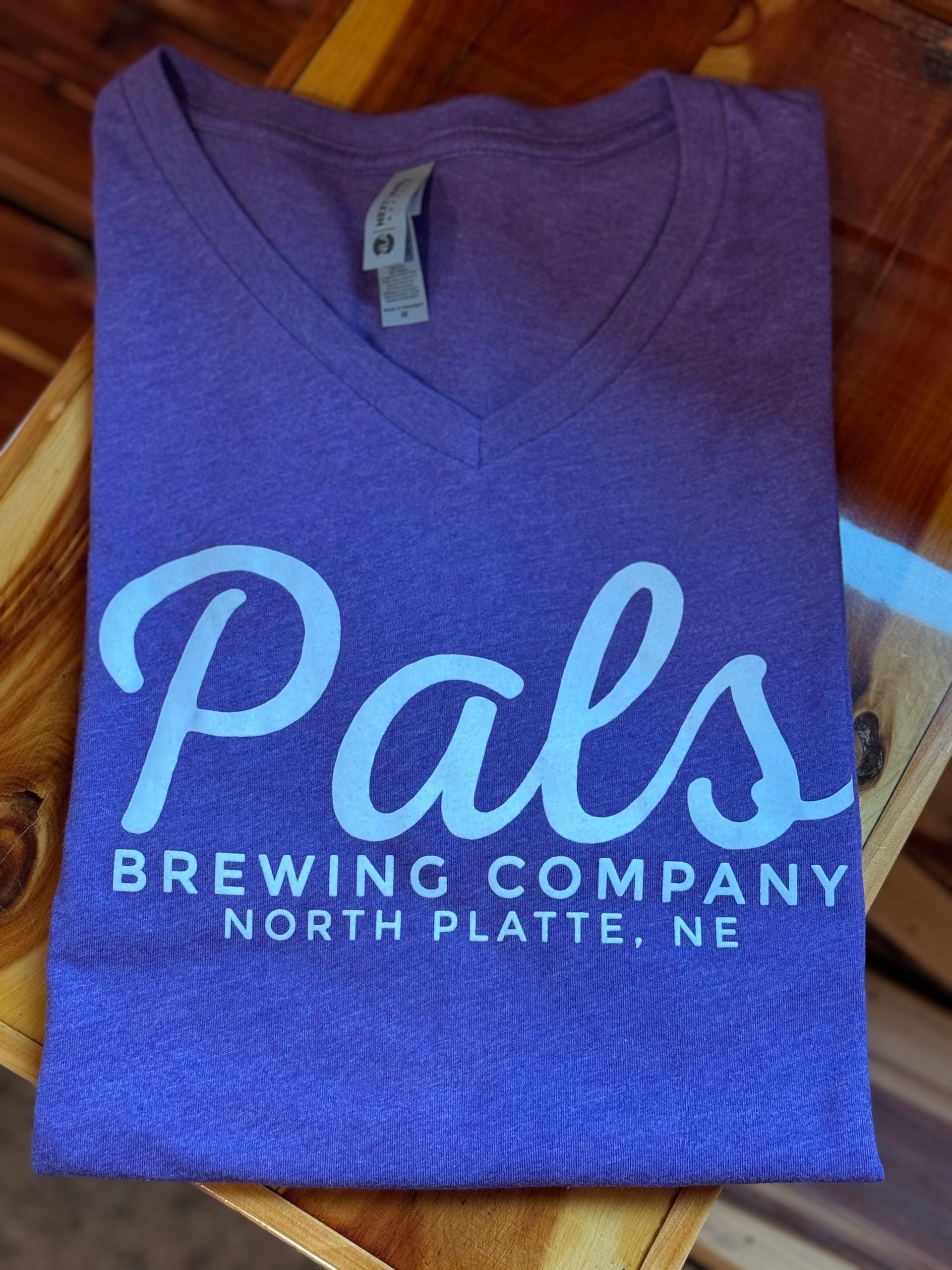Purple v-neck shirt with 
