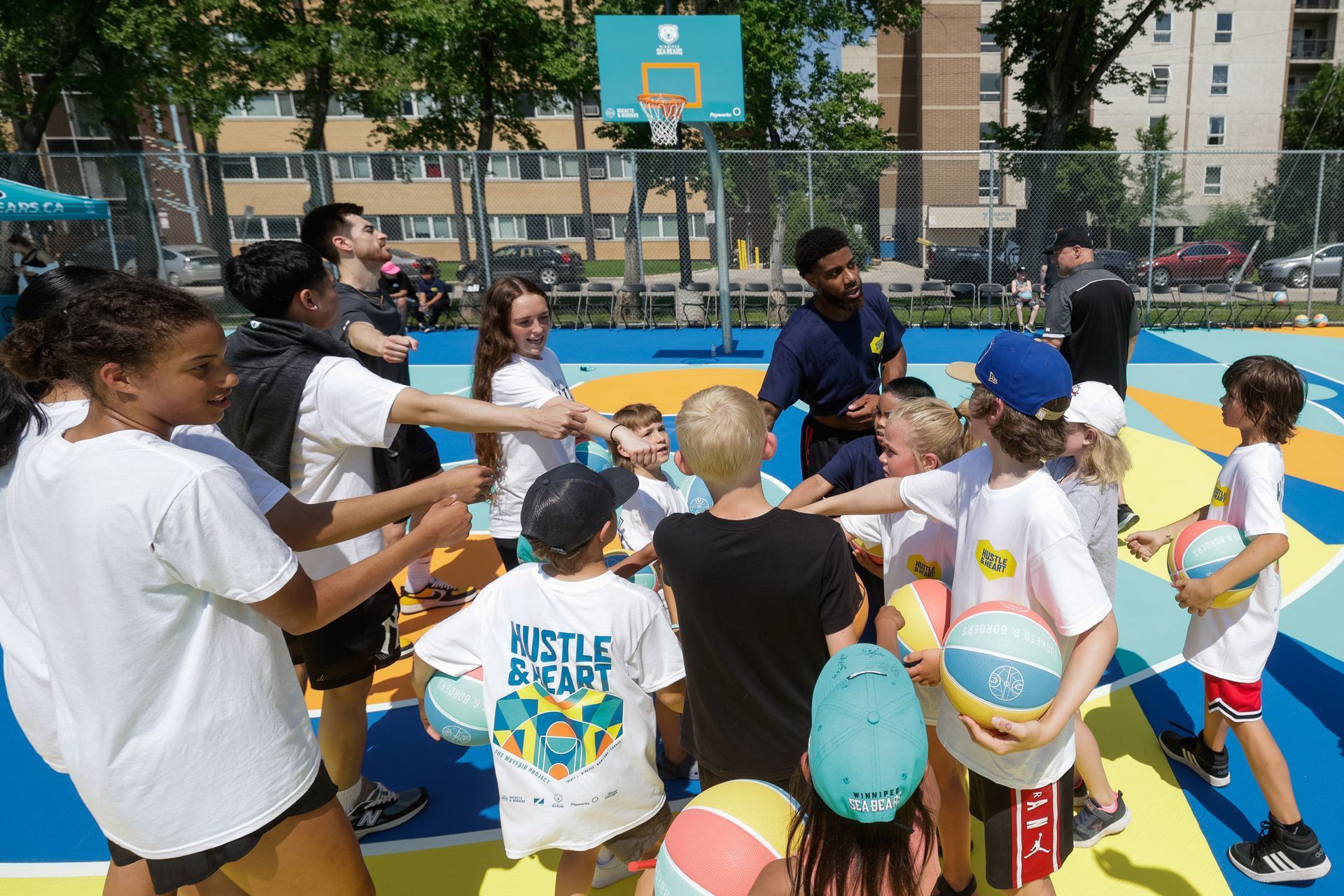 Young players together at a summer basketball clinic