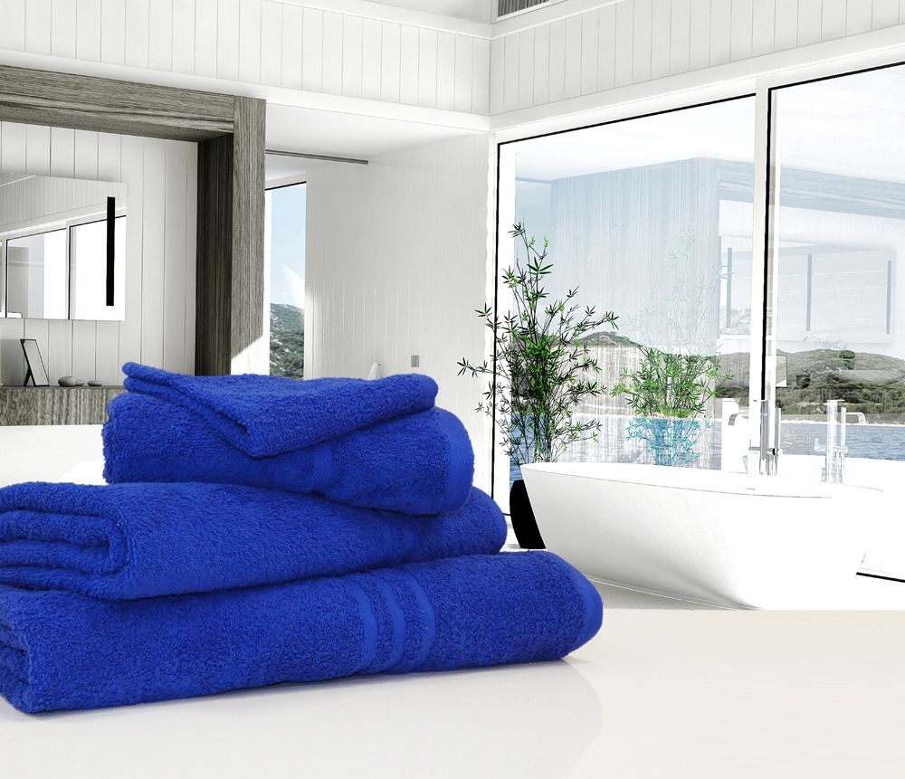 Bale of 500gsm Royal Blue Towels in a Bathroom setting