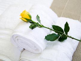 Bale of white towels for clearance sale