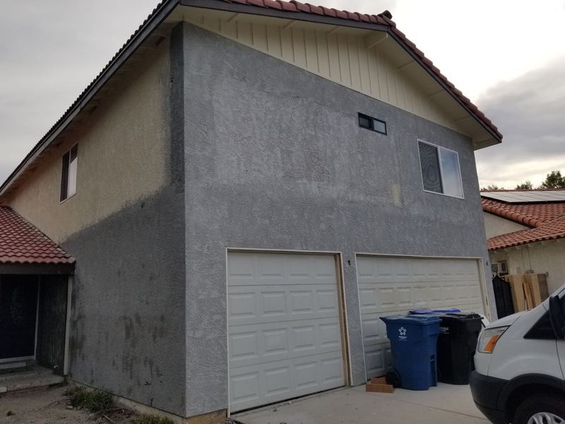 Two-story house with two-car garage. 