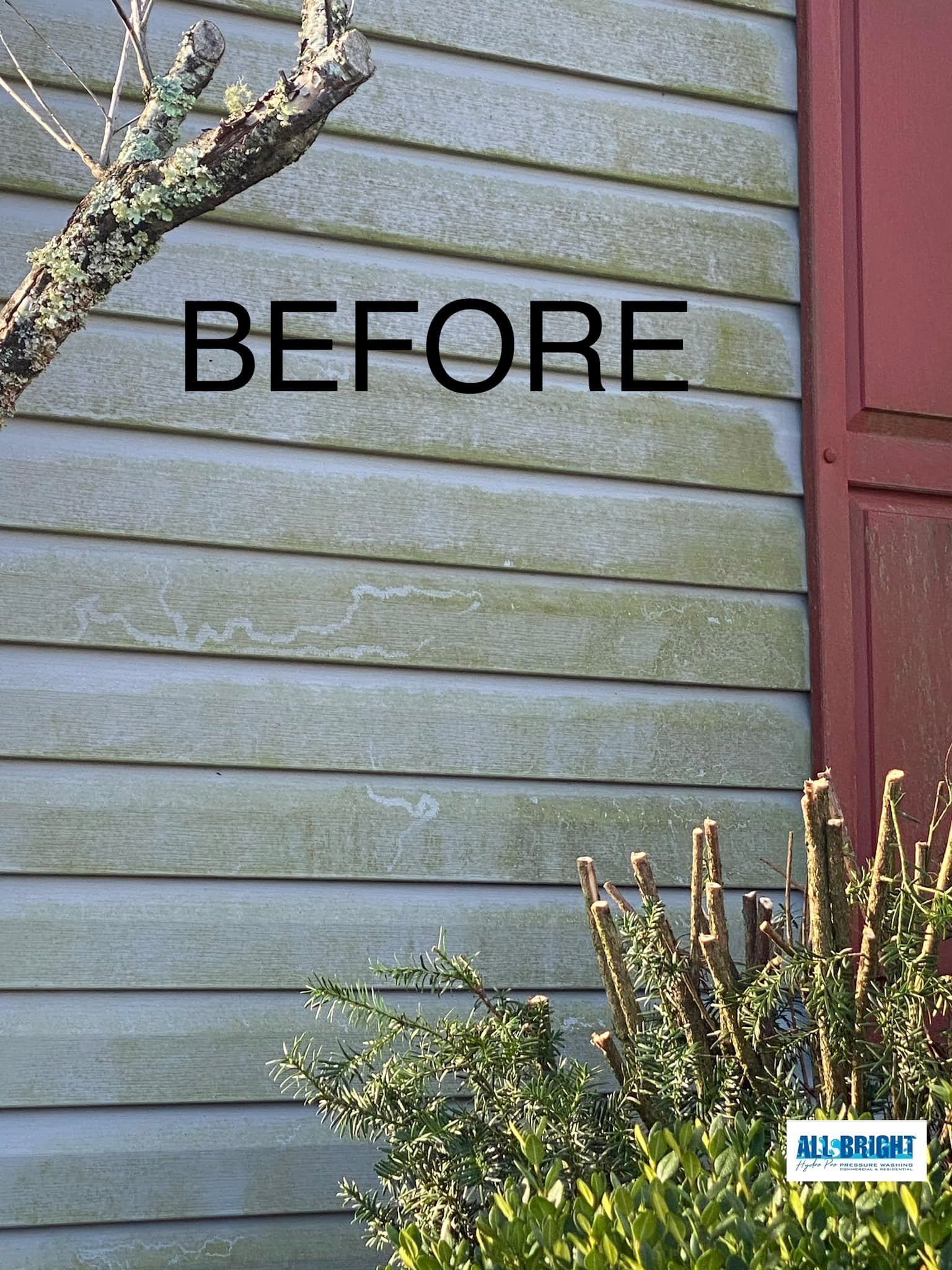 The back of a house with a air conditioner on the side of it.
