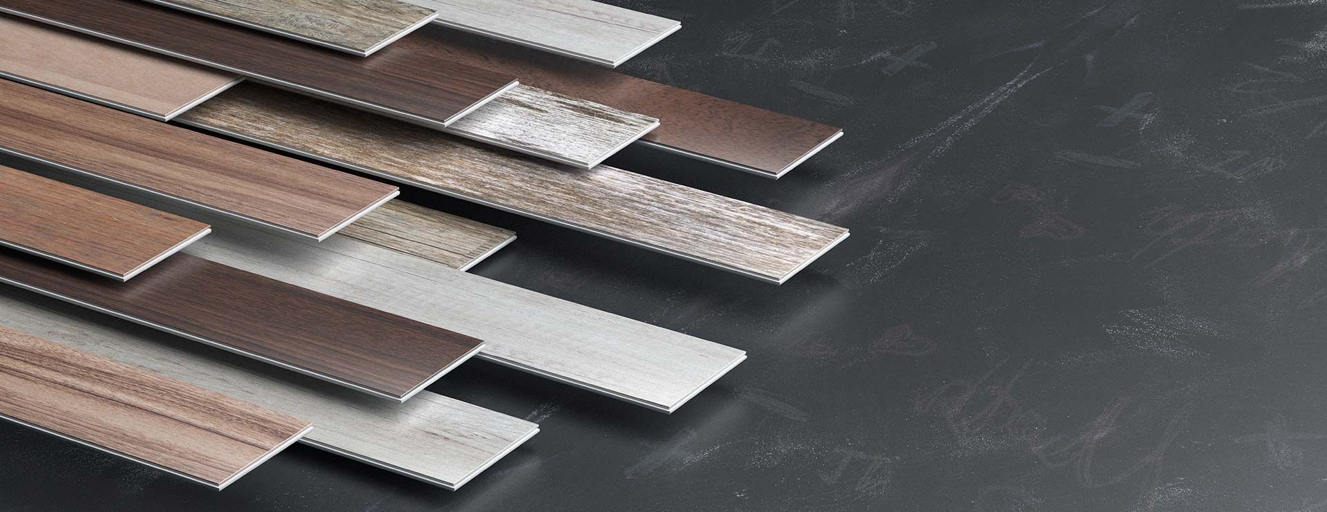 A Close Up Of A Stack Of Vinyl Planks A Table — Affordable Carpets Woolgoolga In Coffs Harbour, NSW