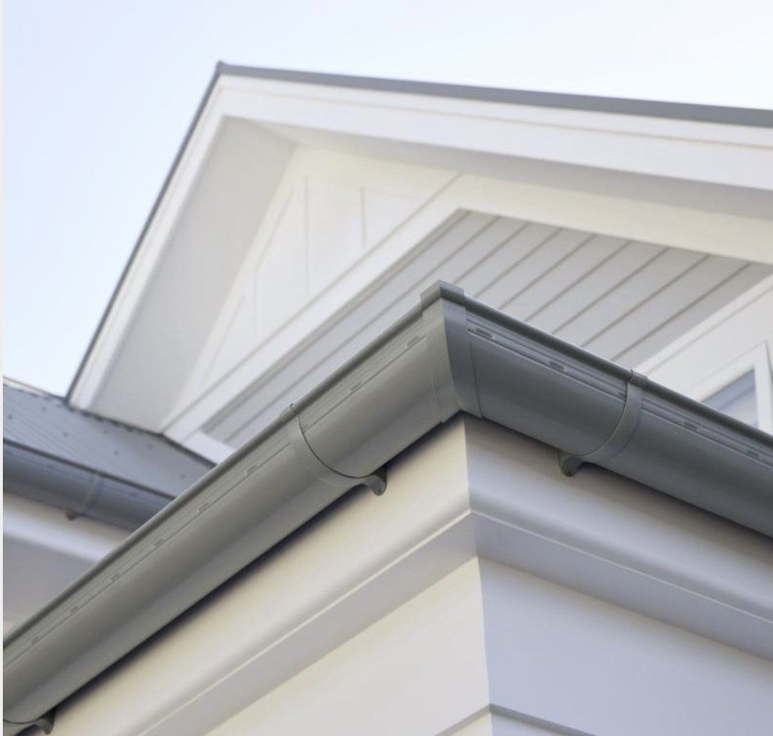 Roof Gutter Attached To Wall— Roofing in Townsville, QLD Roof Gutter Attached To Wall — Top Roof NQ in Townsville, QLD