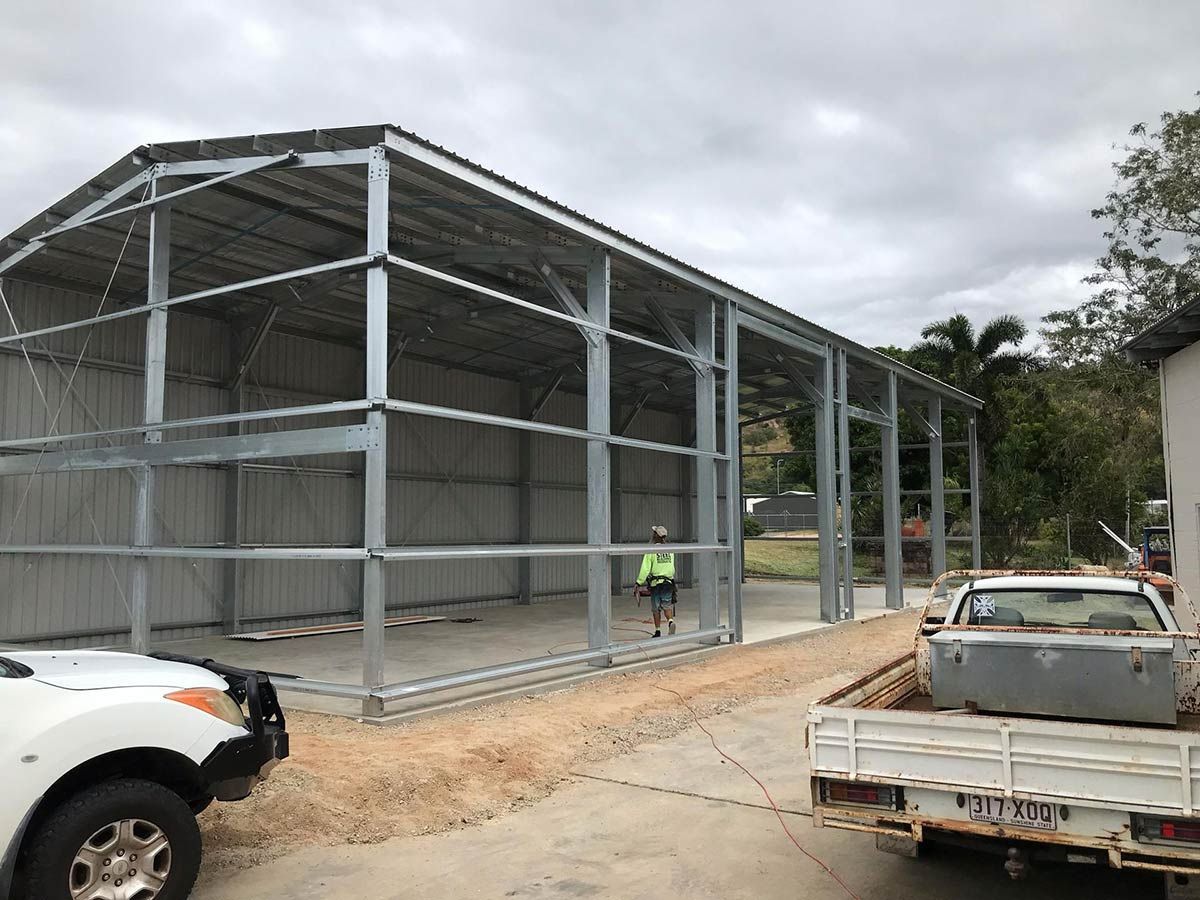A Roof With a White Roof and Wooden Beams — Top Roof NQ in Townsville, QLD