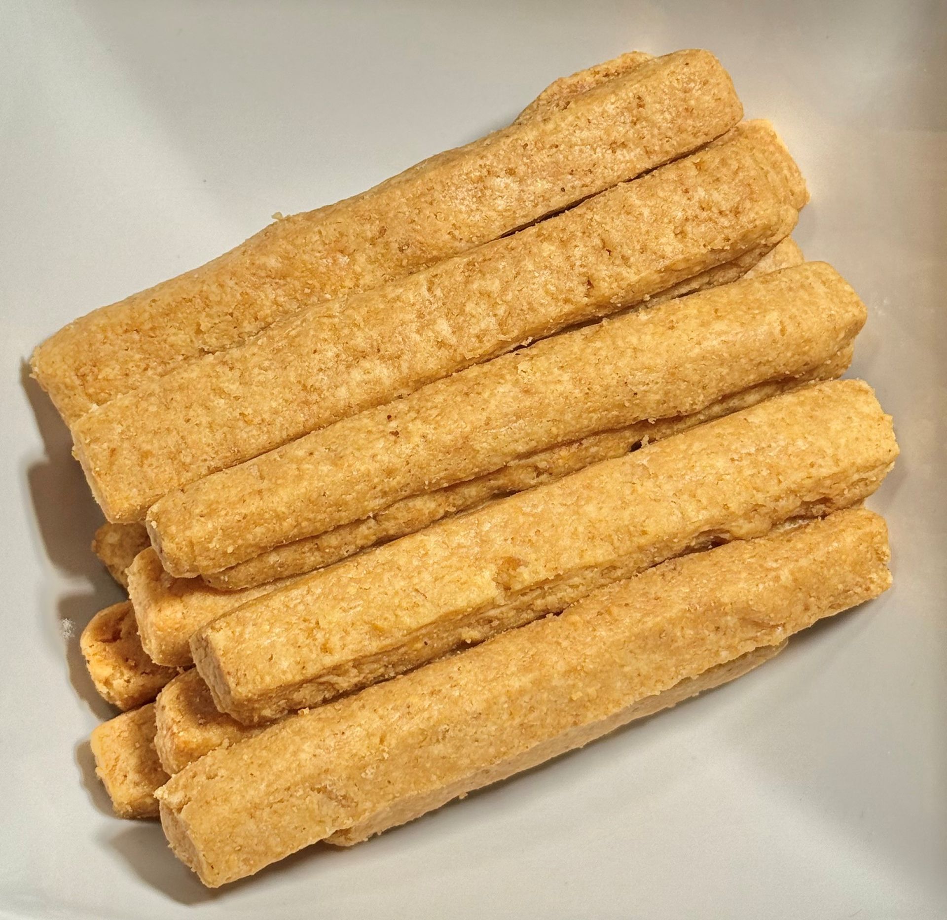 Package of Mrs. Stone's Cheese Straws with label showing text