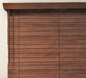 a close up of a elegant grain pattern wooden blind on a window .