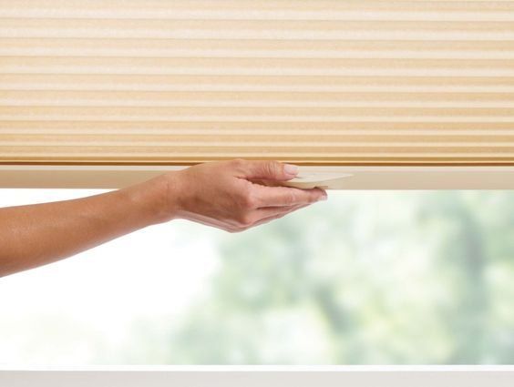 Cellular honeycomb shades with cordless lift and lock available at affordable blinds