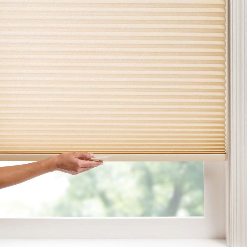 Cellular honeycomb with cordless lift shades available at affordable blinds